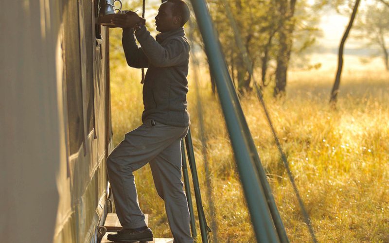 Olakira Camp Morning wake up call with freshly prepared coffee