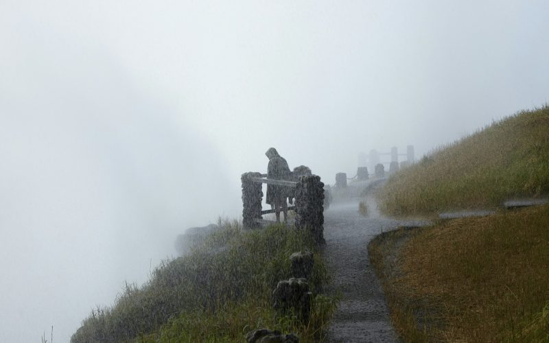 Woman overlooking Victoria Falls, Zambia, Africa